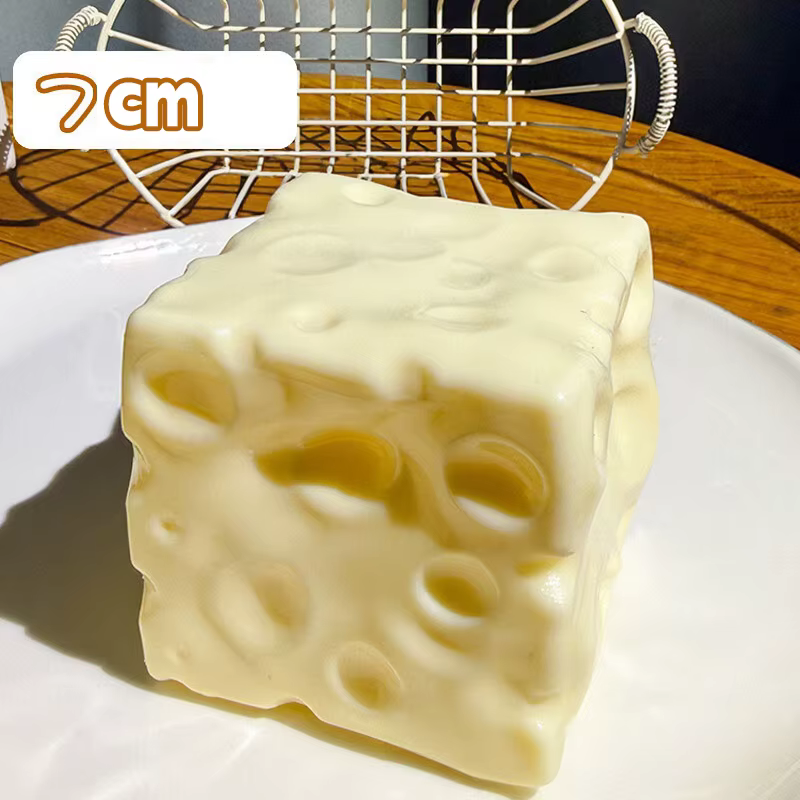 Balle anti-stress en plastique souple, faite à la main, en forme de fromage, à presser, à l'huile de