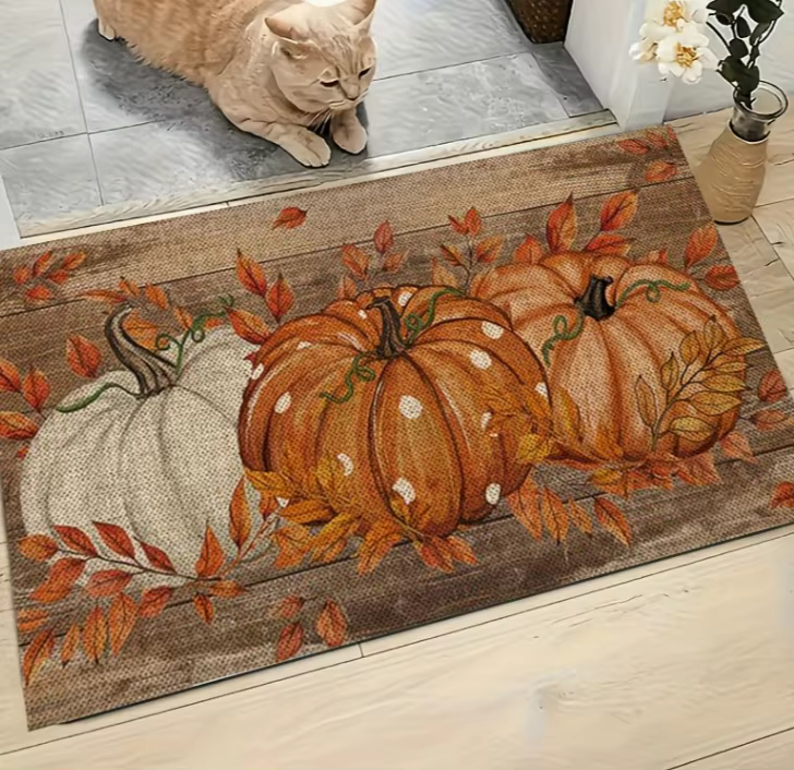 Un seul paillasson d'entrée avec un motif de citrouille d'automne et des pois, esthétique champêtre.