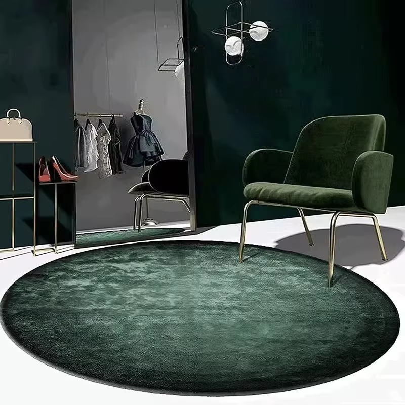 Tapis rond vert foncé de couleur unie