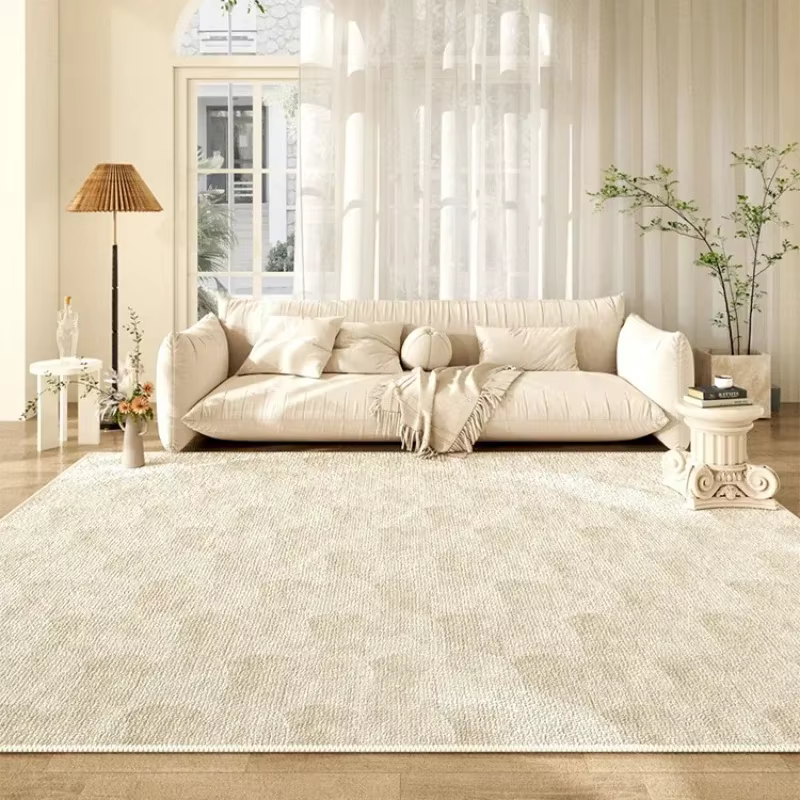 Tapis de grande surface beige à motif géométrique