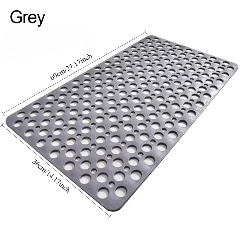 Tapis de bain avec trous de drainage