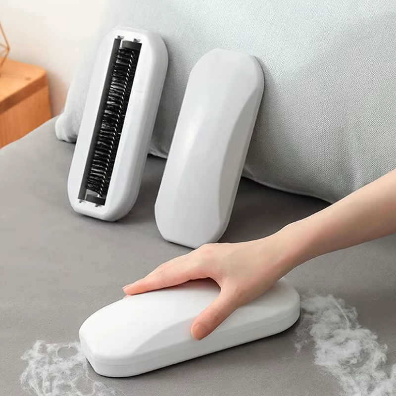 Brosse à poussière pour tapis