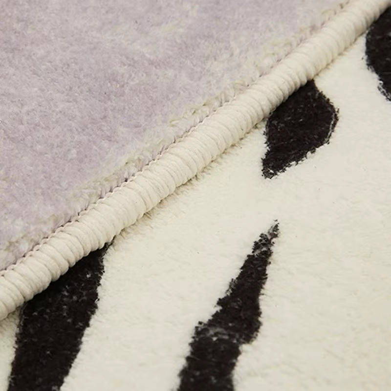 Tapis irrégulier en Faux peau de vache