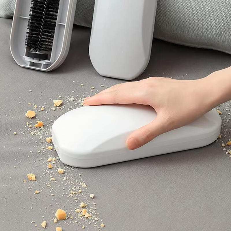 Brosse à poussière pour tapis