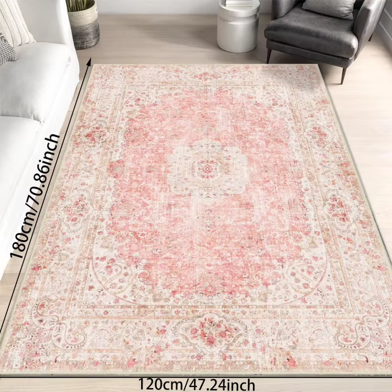 Tapis VIKAMA rose et à motifs persans vintage