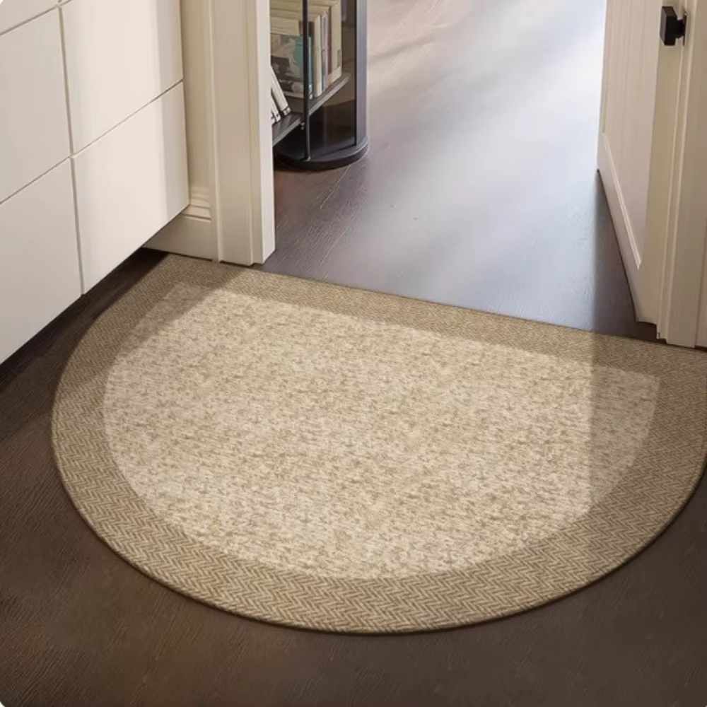Tapis semi-circulaire à bordure tissée