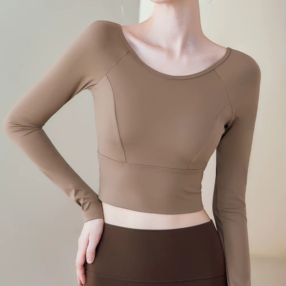 Haut de sport à manches longues pour femme, effet seconde peau, avec soutien-gorge intégré et design croisé en mesh sur le devant, idéal pour le yoga, le pilates et le fitness
