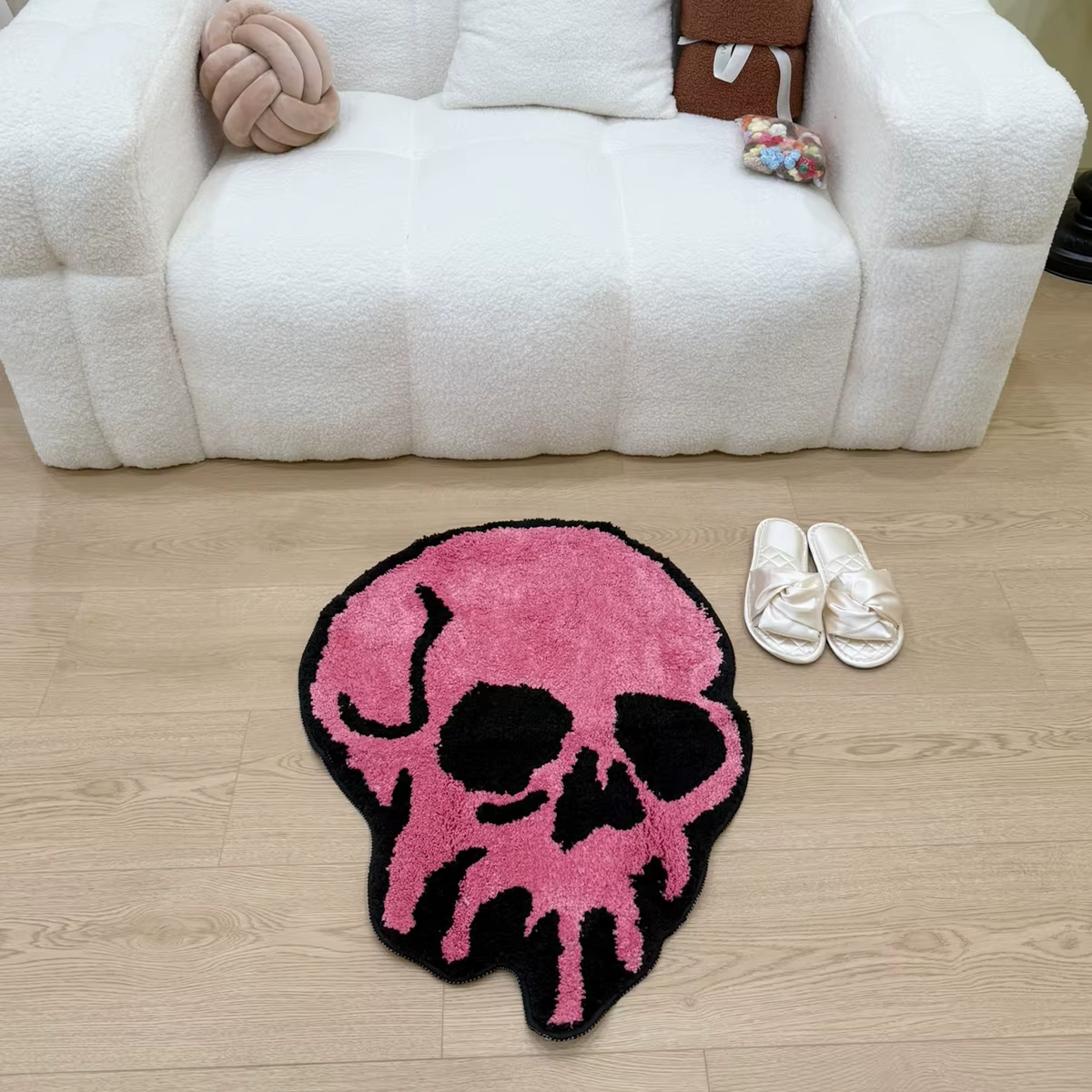 Tapis capitonné en forme de crâne rose