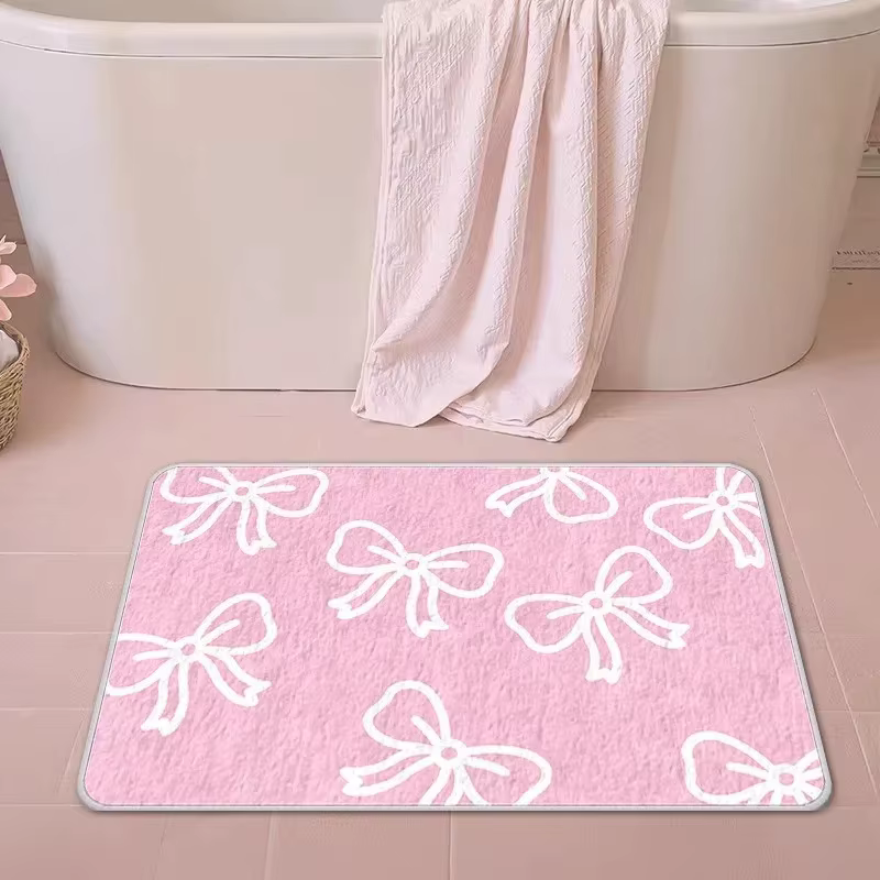 Tapis de bain rose avec nœud papillon VIKAMA